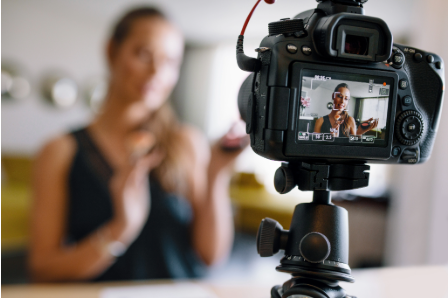 image of a woman doing video marketing